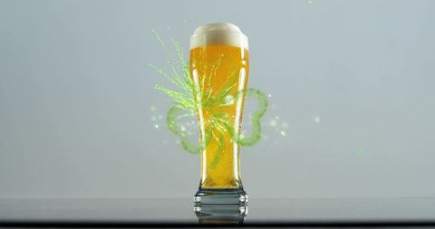 Pilsner glass erupting neon green clover splash, amber beer foam, minimalist reflection