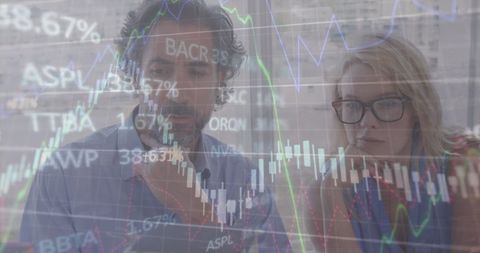 Business Professionals Analyzing Financial Data and Trends