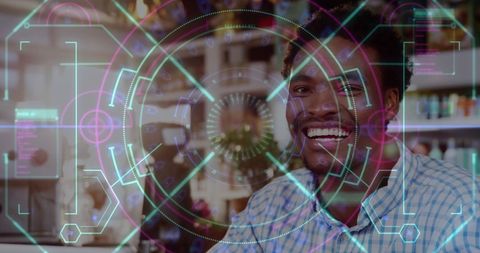 Data processing overlays with smiling man in cafe