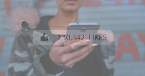 Woman Engaging on Smartphone with Social Media Interaction Icons