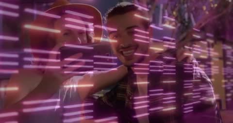 Friends Enjoying Nightlife Posing with Vibrant Lighting