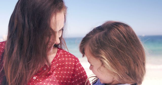 Mother and Child Smiling Together at Beach - Download Free Stock Images Pikwizard.com