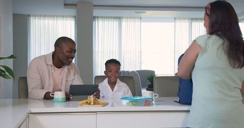 Happy Family Breakfast Time with Laughter and Joy