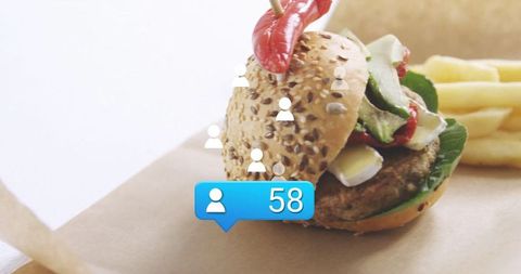 Healthy seeded burger with social interaction on screen