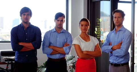 Confident Business Executives Standing with Arms Crossed in Office - Download Free Stock Images Pikwizard.com