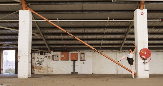 Ballet Dancer Practicing in Industrial Warehouse - Download Free Stock Images Pikwizard.com