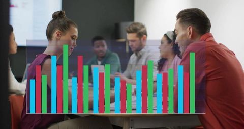 Colleagues Analyzing Financial Data during Team Meeting in Office - Download Free Stock Images Pikwizard.com