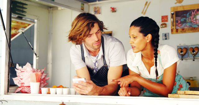 Food Truck Workers Discussing Orders Inside Kitchen - Download Free Stock Images Pikwizard.com