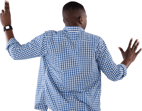 Man appears to interact with futuristic technology, making content versatile for tech or innovation related use. Useful for illustrating modern virtual interfaces, augmented reality or digital innovation.