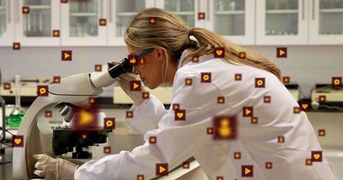 Scientist Using Microscope with Digital Social Media Connections