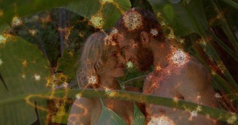 Romantic couple under lush tropical canopy