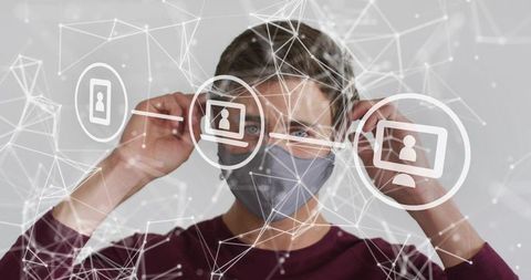 Adult male adjusting face mask with futuristic network overlay connecting virtual profiles