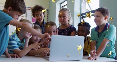 Curious Classroom Kids Crowding Around Laptop Pointing and Collaborating on Digital Project
