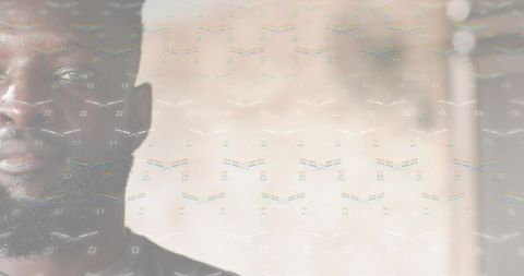 Contemplating bearded man with geometric glitch overlay and soft beige copy space