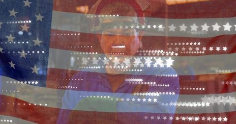 Patriotic steelworker through american flag overlay