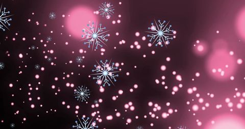 Elegant Snowflakes with Glowing Pink Bokeh on Dark Background
