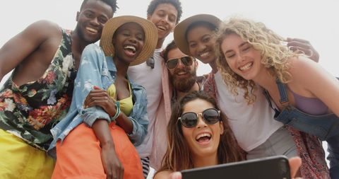 Diverse Group of Friends Smiling Taking Selfie at Beach