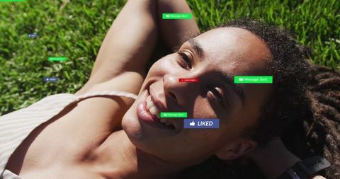 Woman relaxing on grass with social media icons overlay