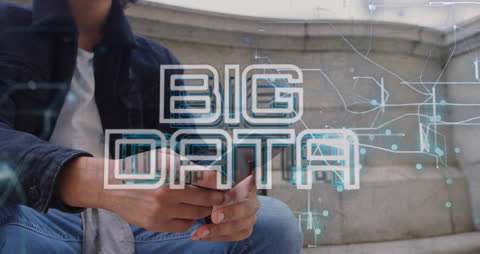 Big Data Concept with Man Using Smartphone and Digital Overlay