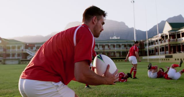 Rugby Players Practicing on Field During Sunrise - Download Free Stock Images Pikwizard.com