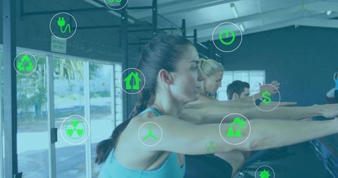 Women Stretching at Fitness Studio With Eco-Friendly Icon Overlay