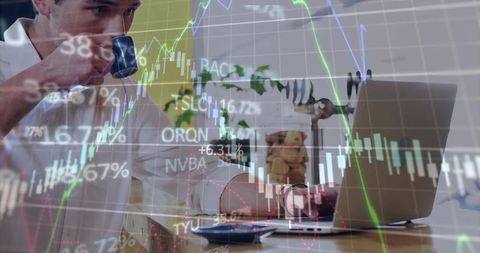 Professional at desk analyzing stock charts with coffee