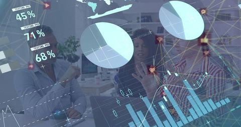 Business professionals analyzing data with holographic projections