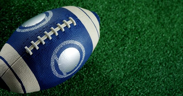 Close-Up of American Football on Green Turf - Download Free Stock Images Pikwizard.com