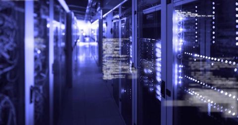 Modern data center server racks with code overlay in blue light