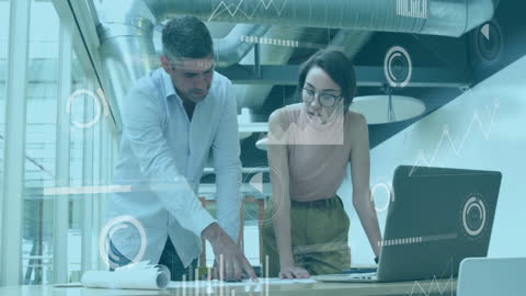 Collaborating Business Professionals in High-Tech Office Environment