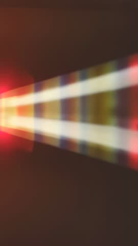 Vertical prism light beams sliding across wall with white stripe and red flares, cinematic loop