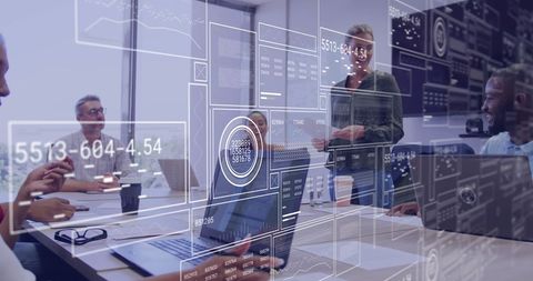 Diverse Team Analyzing Data in Modern Corporate Meeting