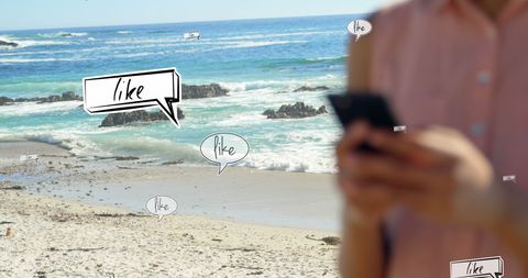 Person Enjoying Beach with Smartphone and Social Media Interaction