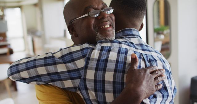 Warm Hug Between Two Generations Indoors - Download Free Stock Images Pikwizard.com