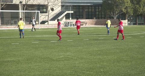 Soccer players preparing for upcoming match illustrating teamwork and strategy