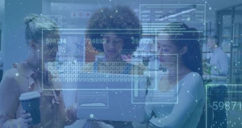 Diverse Team Collaborating on Data Analytics in Office with Laptop