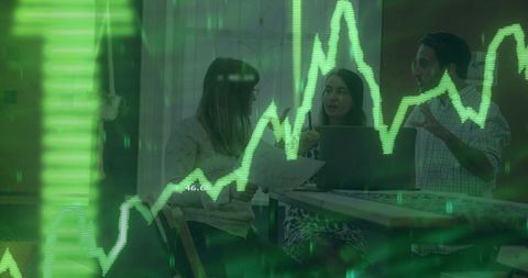 Business Professionals Analyzing Stock Trends with Digital Financial Charts