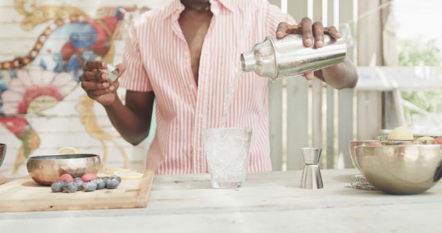 Bartender Mixing Drink in Outdoor Beach Bar - Download Free Stock Images Pikwizard.com