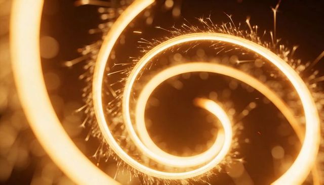 Glowing golden spiral light trail with sparkler sparks, warm bokeh, motion abstract energy loop