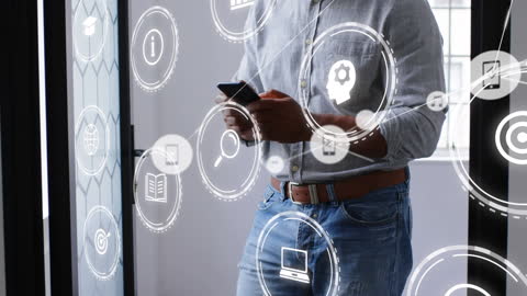 Businessman Connecting Digitally with Smartphone Hologram Icons