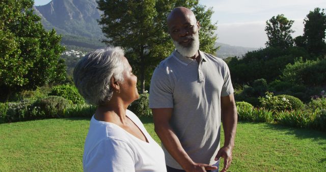 African american senior couple meditating together while standing in the garden - Download Free Stock Photos Pikwizard.com