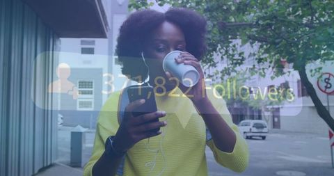 African American Woman Engaging on Smartphone with Social Media Notifications