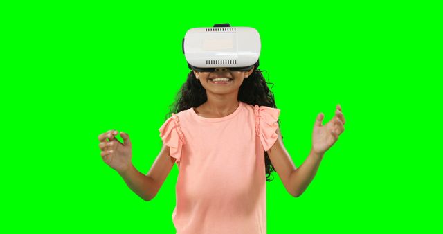 Young Girl Experiencing Virtual Reality with Headset on Green Screen Background - Download Free Stock Images Pikwizard.com