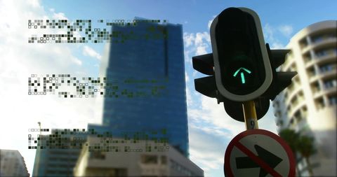 Digital Data Overlay on Cityscape Featuring Traffic Light
