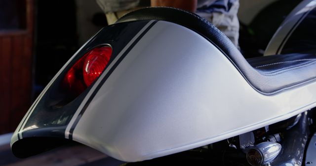 Close-Up of Motorcycle Seat with Retro Design and Red Tail Light - Download Free Stock Images Pikwizard.com