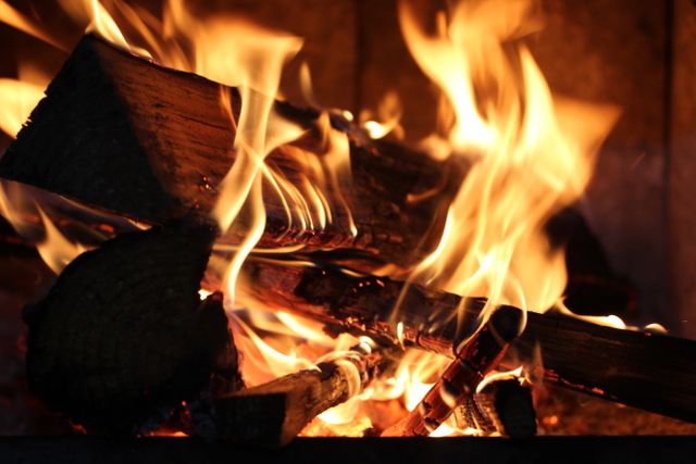 Close-up of Warm Firewood Burning in Fireplace - Download Free Stock Photos Pikwizard.com
