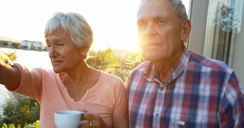 Senior Couple Relaxing Outdoors Sightseeing Enjoying Retirement