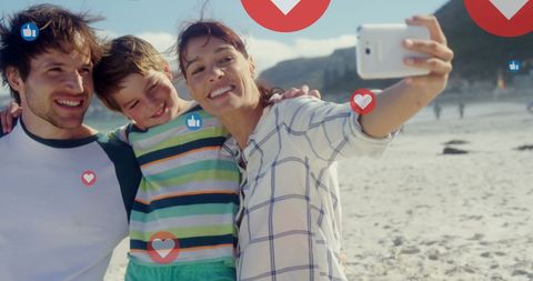 Happy Family Taking Selfie on Beach with Social Media Icons - Download Free Stock Images Pikwizard.com