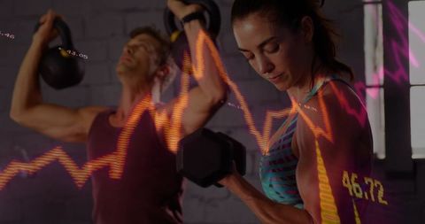 Gym workout duo lifting dumbbell and kettlebell with live fitness data overlay