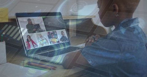 Student attending virtual classroom on laptop with holographic edtech overlay
